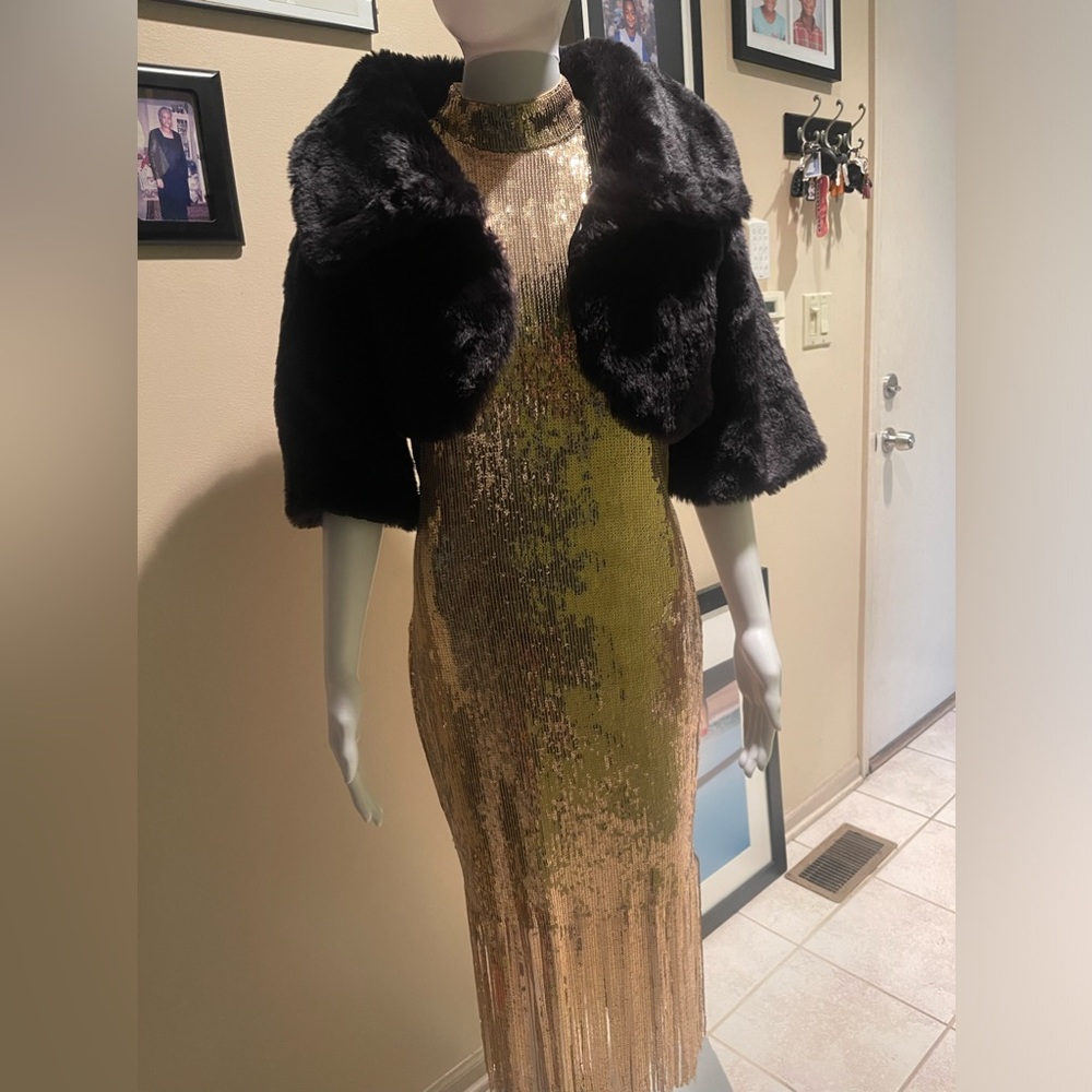 Metallic gold (sleeveless) dress with fringes at the bottom